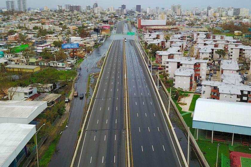 An aerial view of an empty main highway is seen in aftermath of Hurricane Maria in San Juan, Puerto Rico, on September 21, 2017. Puerto Rico braced for potentially calamitous flash flooding after being pummeled by Hurricane Maria which devastated the island and knocked out the entire electricity grid. The hurricane, which Puerto Rico Governor Ricardo Rossello called "the most devastating storm in a century," had battered the island of 3.4 million people after roaring ashore early Wednesday with deadly winds and heavy rain. / AFP PHOTO / Ricardo ARDUENGORICARDO ARDUENGO/AFP/Getty Images ** OUTS - ELSENT, FPG, CM - OUTS * NM, PH, VA if sourced by CT, LA or MoD **
