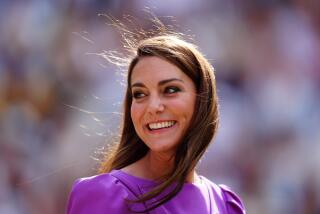 The Princess of Wales smiles in an electric purple dress at the 2024 Wimbledon Singles final trophy presentation