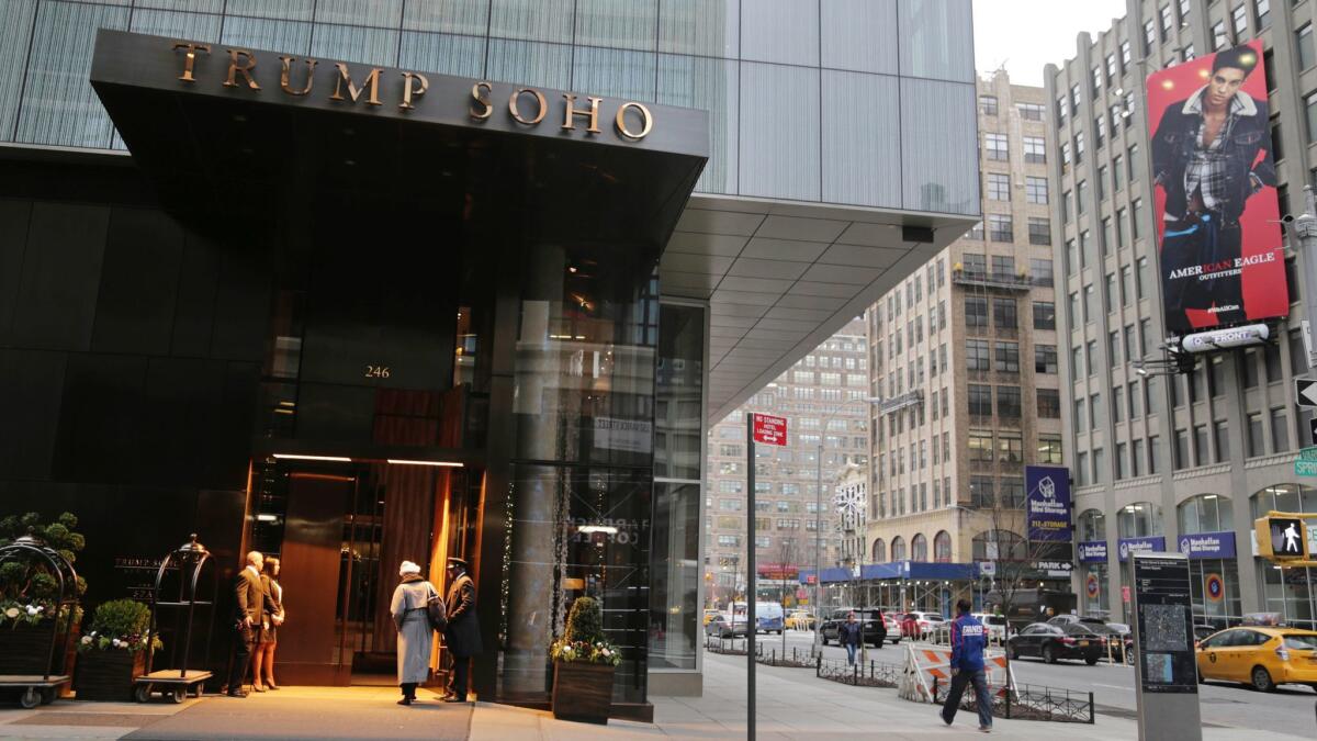 The Lakers won't stay at the Trump Soho hotel as originally planned this week.