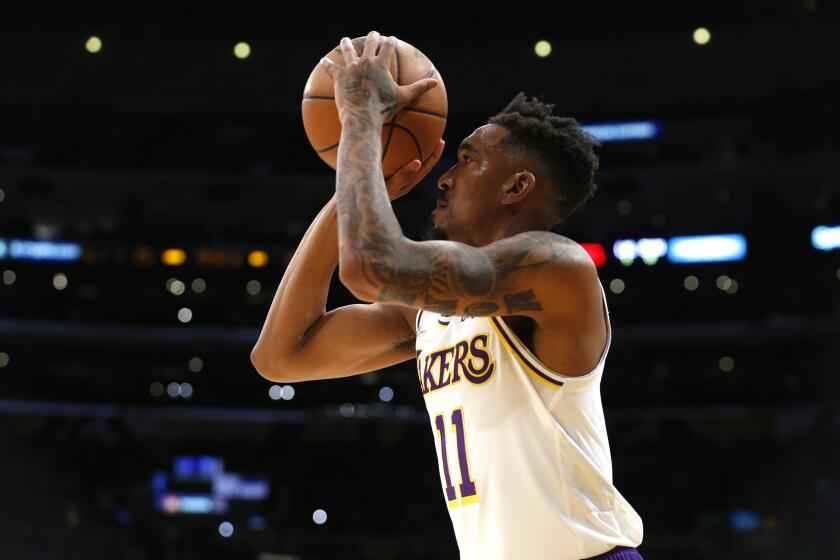 LOS ANGELES, CA - DECEMBER 25: Los Angeles Lakers guard Malik Monk (11) takes a shot.