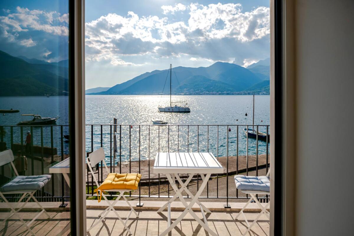 A balcony with a waterfront view