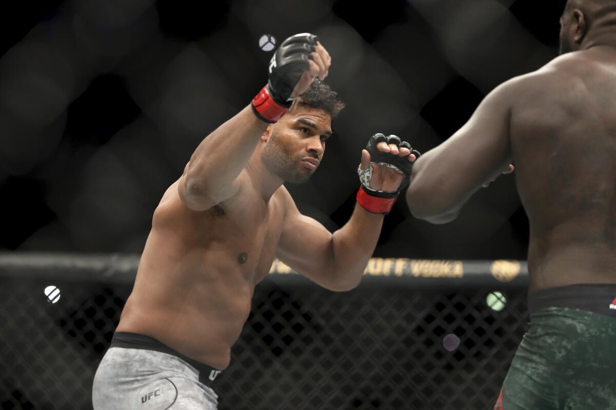 Alistair Overeem, left, in action against Jairzinho Rozenstruik during their UFC bout Dec. 8, 2019, in Washington, D.C. 