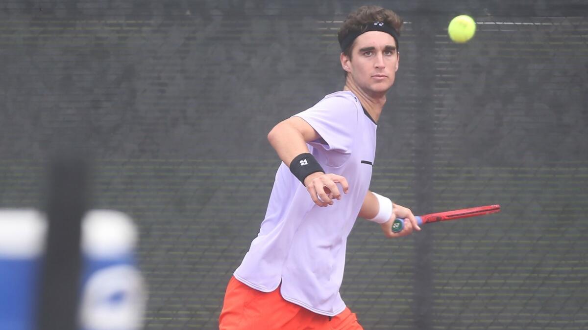Max McKennon, shown hitting a forehand during a USTA Southern California Junior Sectional Championships match on June 21, 2019, is ranked No. 62 in the in the world in the ITF juniors.
