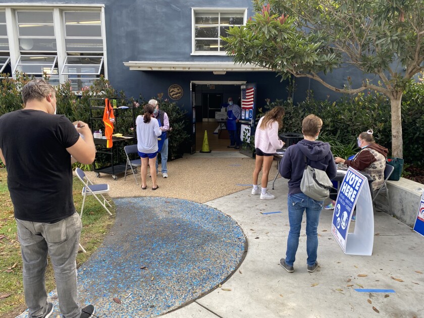 Voters prepare to cast their ballots Nov. 3 at La Jolla Elementary School.