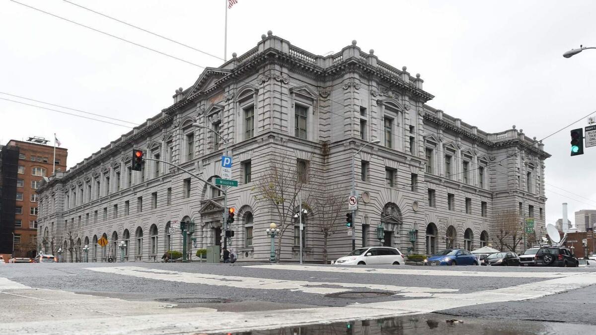 A federal appeals court panel Tuesday struck down as overly broad a federal law that makes it a felony to encourage someone to violate immigration laws. Above, the 9th Circuit Court of Appeals in San Francisco.