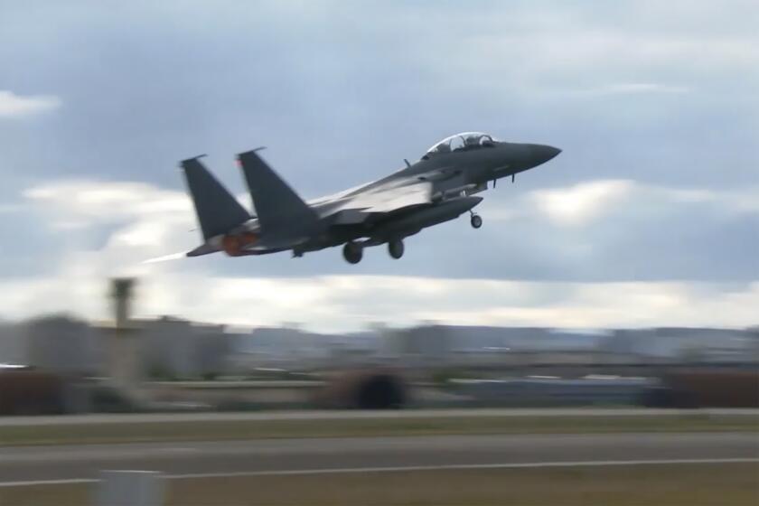 FILE - In this image taken from video, South Korean Air Force's F15K fighter jet takes off Tuesday, Oct. 4, 2022, in an undisclosed location in South Korea. South Korea says North Korea flew 12 warplanes near their mutual border on Thursday, Oct. 6, 2022, prompting South Korea to scramble 30 military planes in response. (South Korean Defense Ministry via AP)