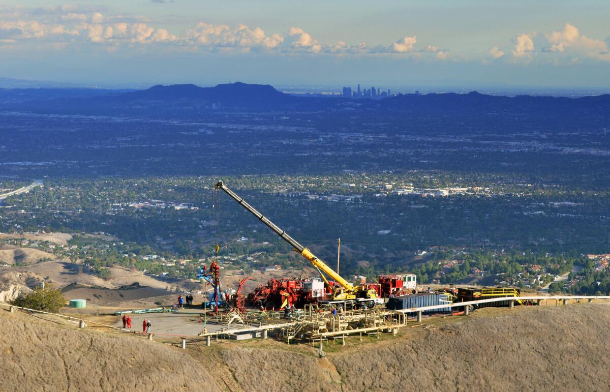 This Nov. 3 photo provided by Southern California Gas Co. shows equipment being used as crews and technical experts try to stop the flow of natural gas leaking from a storage well at the utility's Aliso Canyon facility.