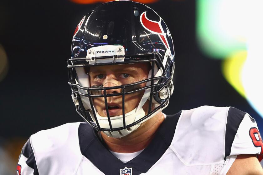 Texans defensive end J.J. Watt gets set to play against the Patriots last week.