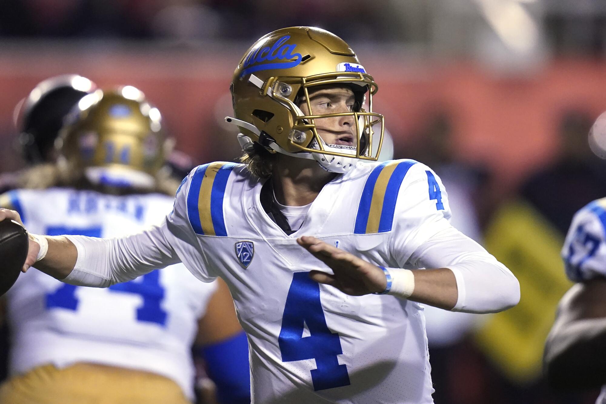 UCLA quarterback Ethan Garbers (4) throws a pass against Utah