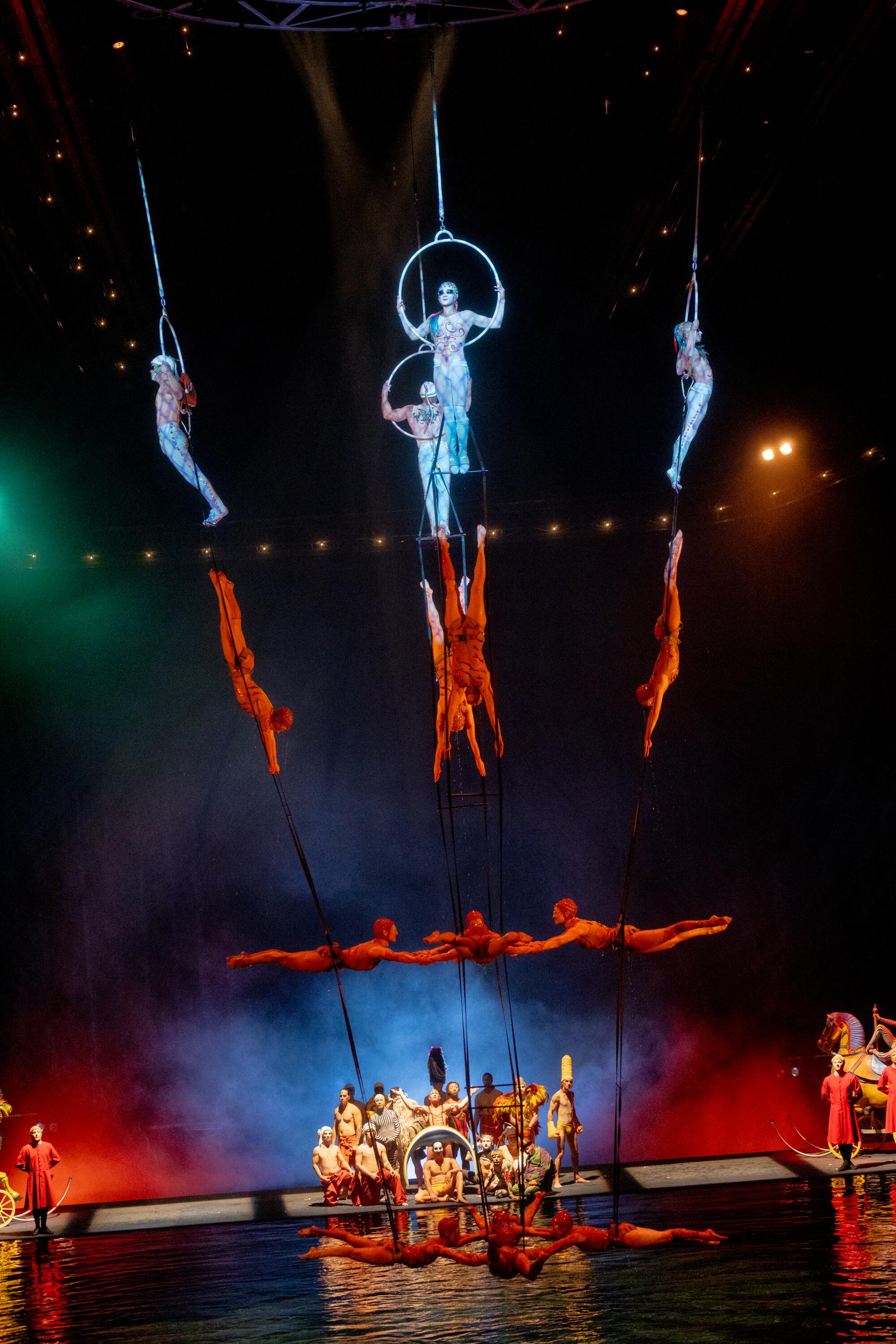Aerialists perform onstage during Cirque du Soleil's "O."