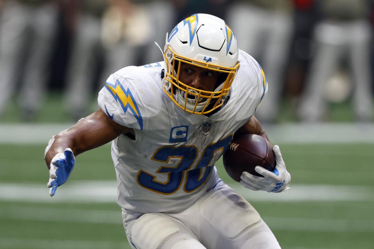 Chargers running back Austin Ekeler carries the ball against the Atlanta Falcons on Nov. 6, 2022.