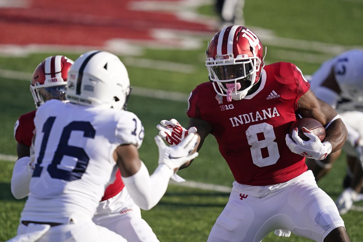 Indiana running back Stevie Scott III runs against Penn State's Ji'Ayir Brown.
