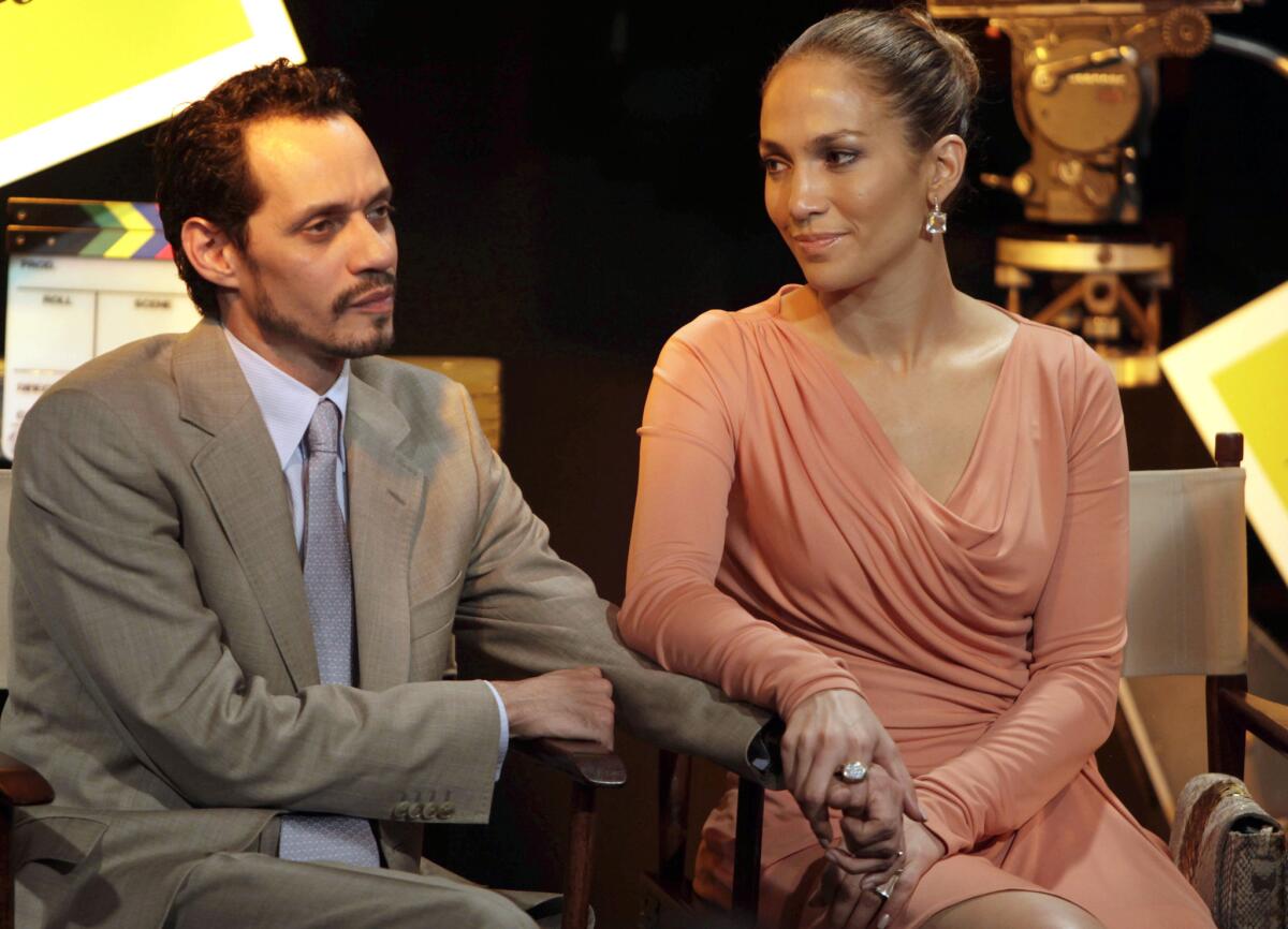 Jennifer Lopez and Marc Anthony, seen together in 2011 months before they announced their plan to divorce, are finally unmarried.