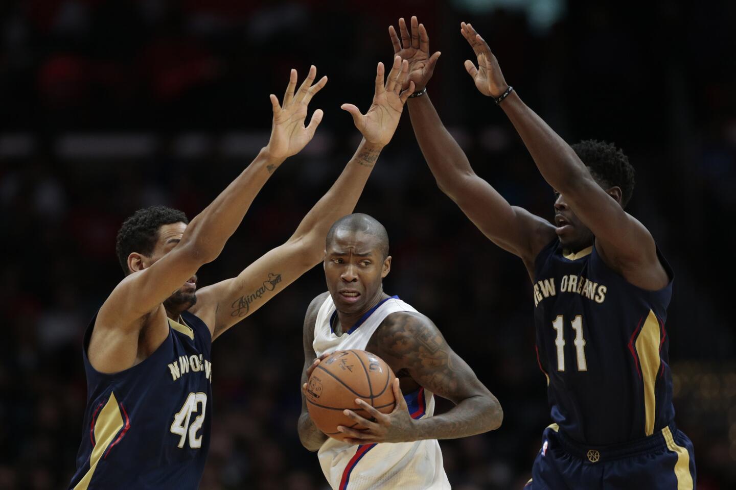 Alexis Ajinca, Jamal Crawford, Jrue Holiday