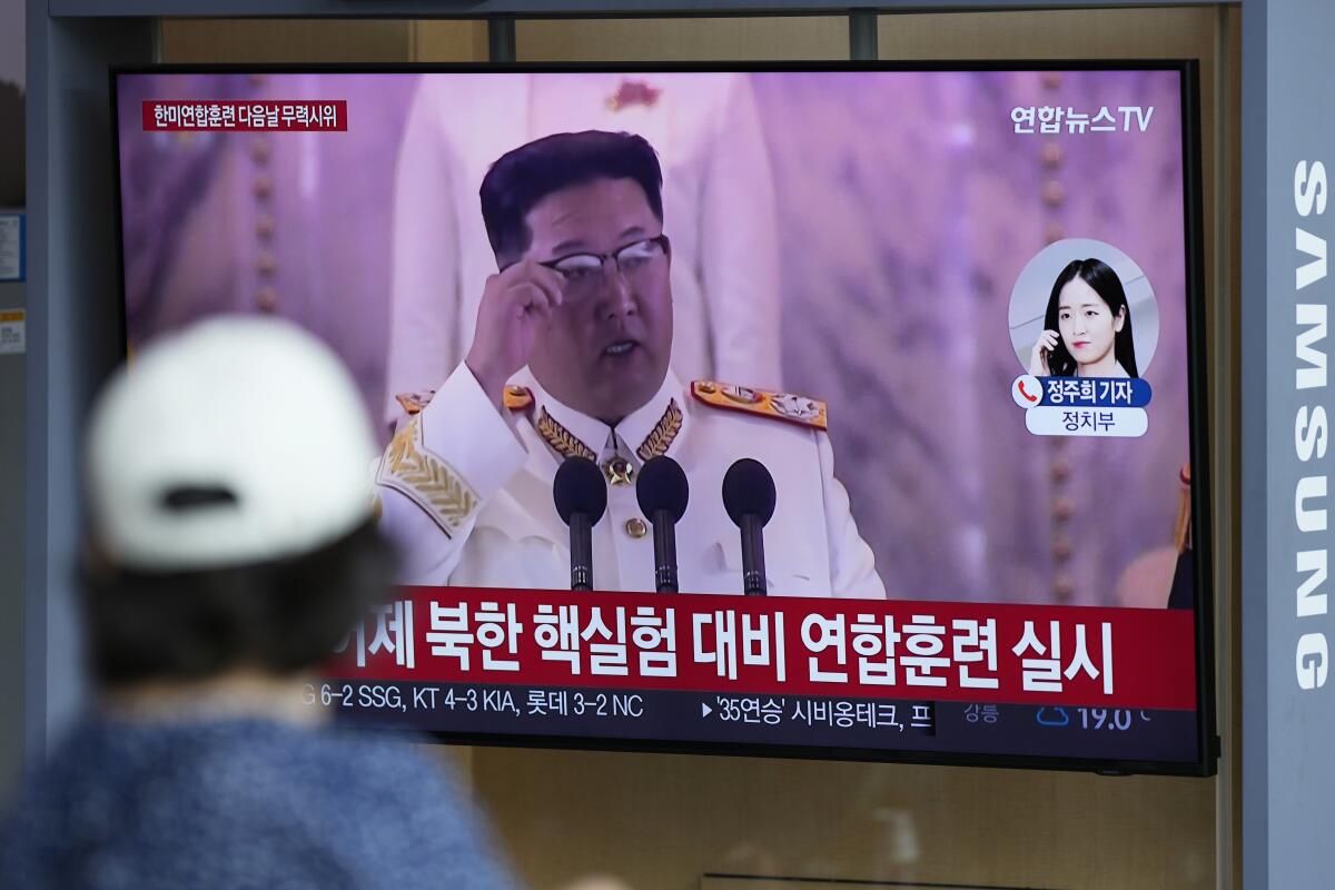 News coverage of North Korea's missile launch is shown on a TV monitor at a train station in Seoul on Sunday.