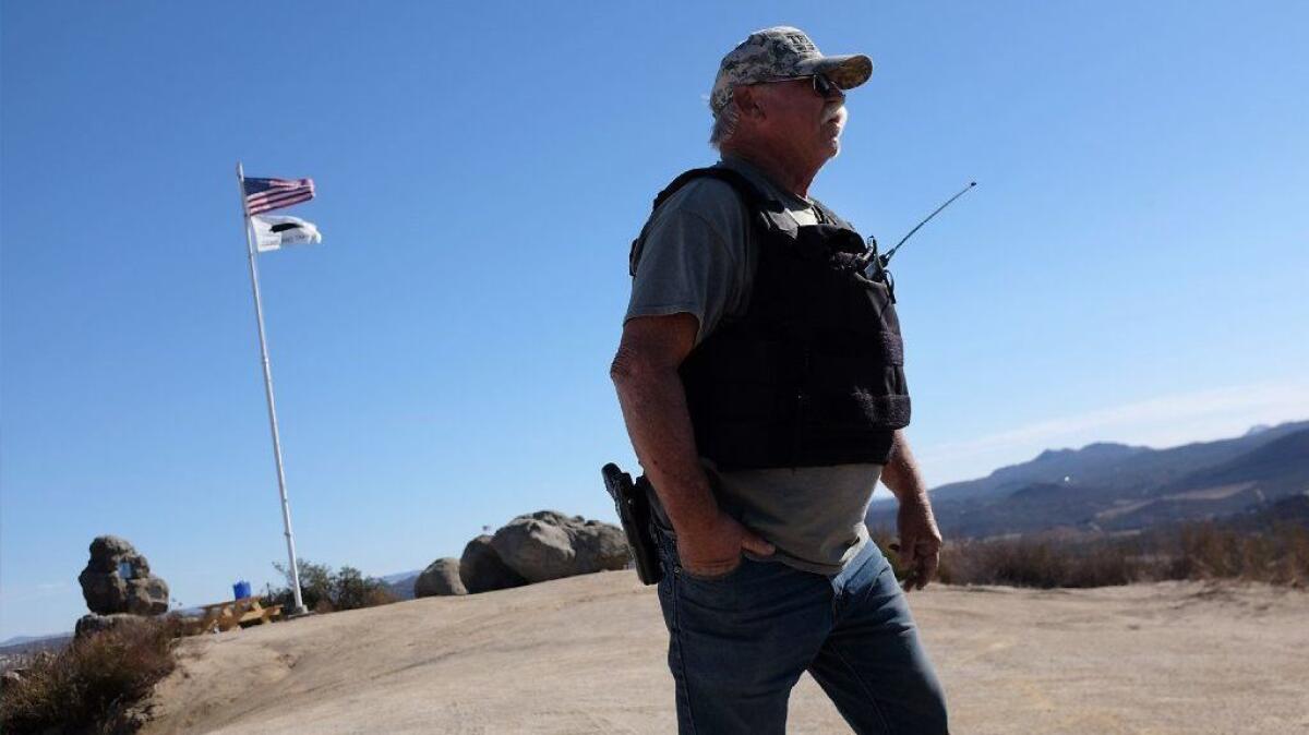 Robert Crooks is one of several armed militiamen who have been patrolling the U.S.-Mexico border near Campo, Calif.