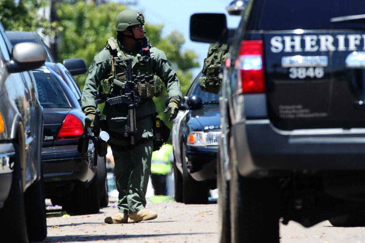 San Diego County Sheriff's SWAT team took a man in to custody after a brief standoff in Imperial Beach.