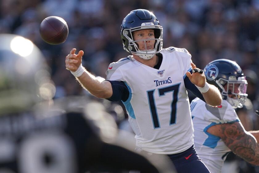 OAKLAND, CALIFORNIA - DECEMBER 08: Ryan Tannehill #17 of the Tennessee Titans throws pass against the Oakland Raiders during the first half of an NFL football game at RingCentral Coliseum on December 08, 2019 in Oakland, California. (Photo by Thearon W. Henderson/Getty Images)