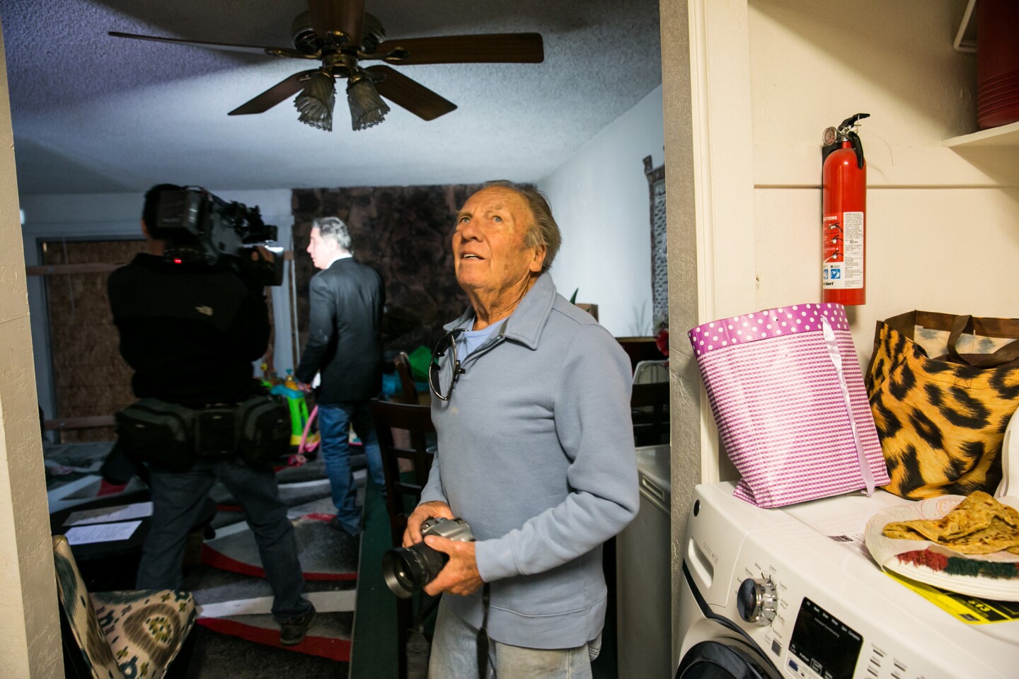 Landlord Doyle Miller, opens the doors and allows the media access inside the Redlands townhome where Syed Rizwan Farook and Tafsheen Malik, suspects of the deadly the recent mass shootings in San Bernardino, lived.