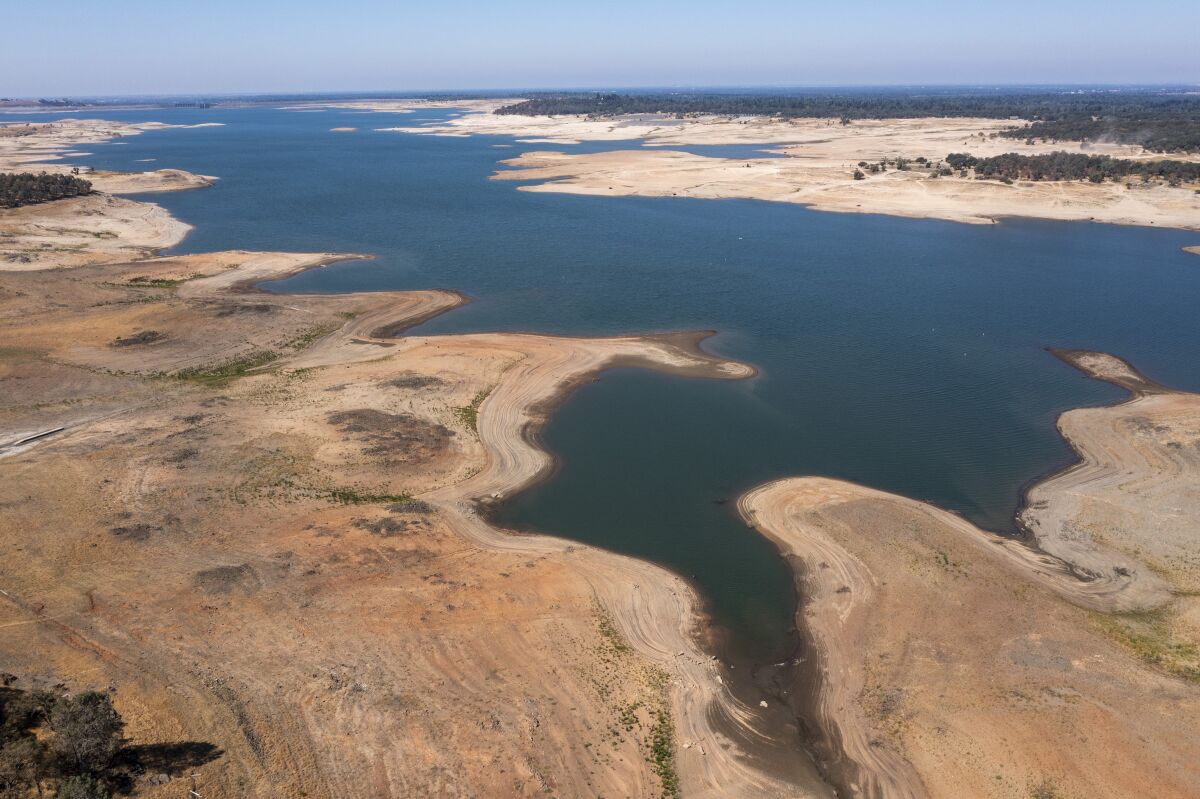 Dry lake bed is exposed as the water level recedes at Folsom Lake near Sacramento on July 1. 