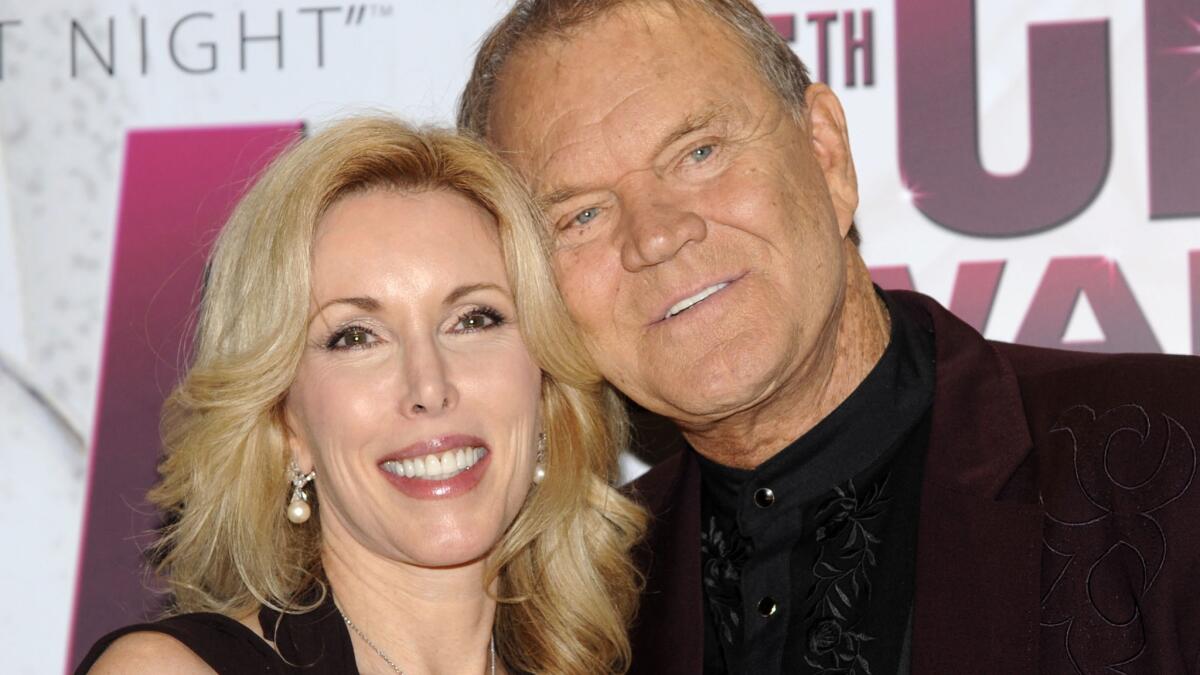 Singer Glen Campbell and his wife, Kim, at the CMA Awards in late 2011, several months after his Alzheimer's diagnosis was revealed.