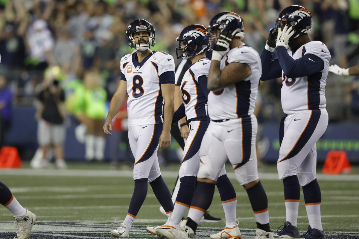 Denver Broncos place kicker Brandon McManus (8) reacts after his field goal attempt went wide during the second half of an NFL football game against the Seattle Seahawks, Monday, Sept. 12, 2022, in Seattle. The Seahawks won 17-16. (AP Photo/John Froschauer)