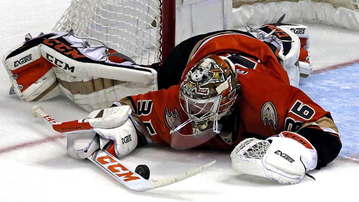 Ducks goalie John Gibson (36) corrals the puck against the Blackhawks during the third Friday night.