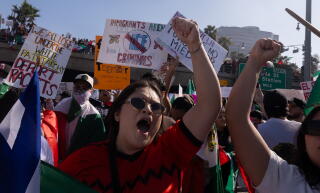 Thousands of protesters gathered downtown to demonstrate for immigration rights.