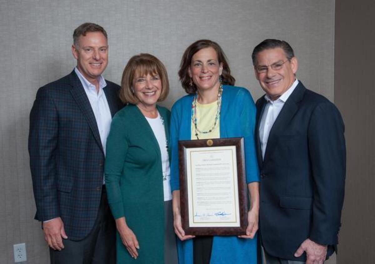 Congressmembers Scott Peters and Susan Davis with JCF president/CEO Beth Sirull and board chair Leo Spiegel at the JCF 50th anniversary celebration
