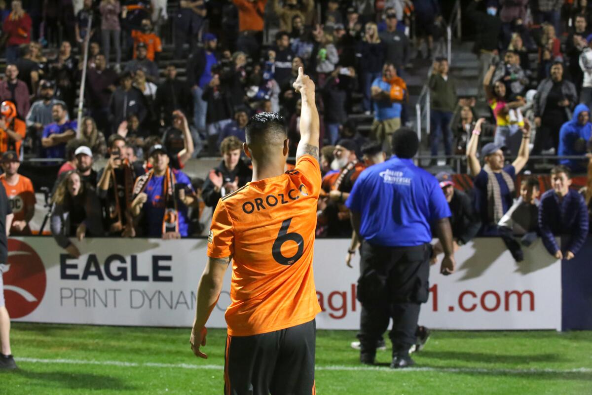 Michael Orozco (6) points to the crowd after winning the Western Conference semifinals of the USL Championship in 2021.