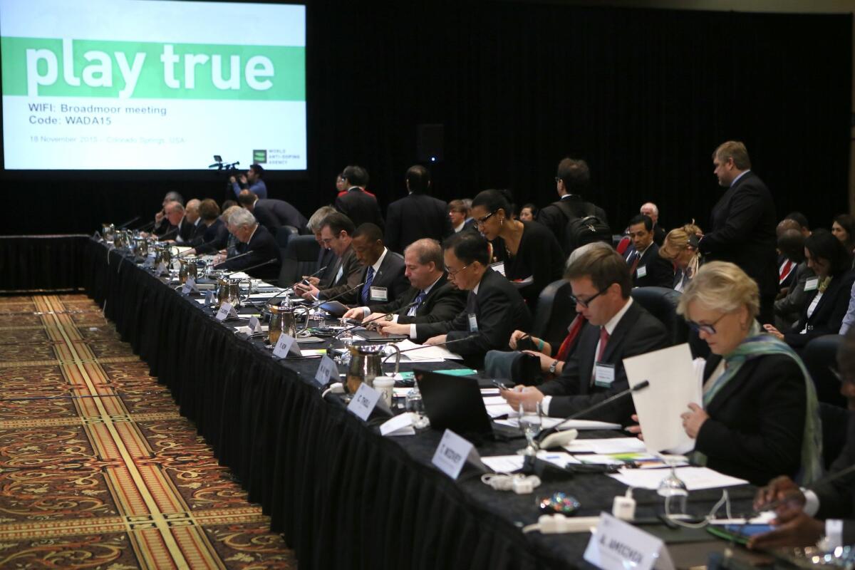 Members get ready for the World Anti-Doping Agency meeting in Colorado Springs, Colo.