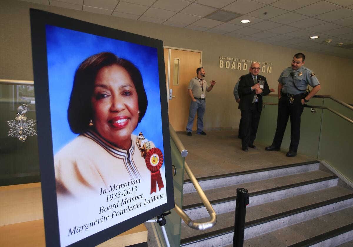 A portrait of Marguerite Poindexter LaMotte, who died this month, stands near the doors to the school board meeting room at Los Angeles Unified headquarters.