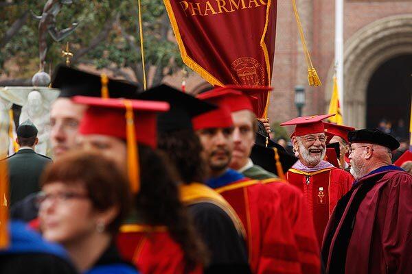 Faculty members march in a procession for the inauguration of USC President C.L. "Max" Nikias.