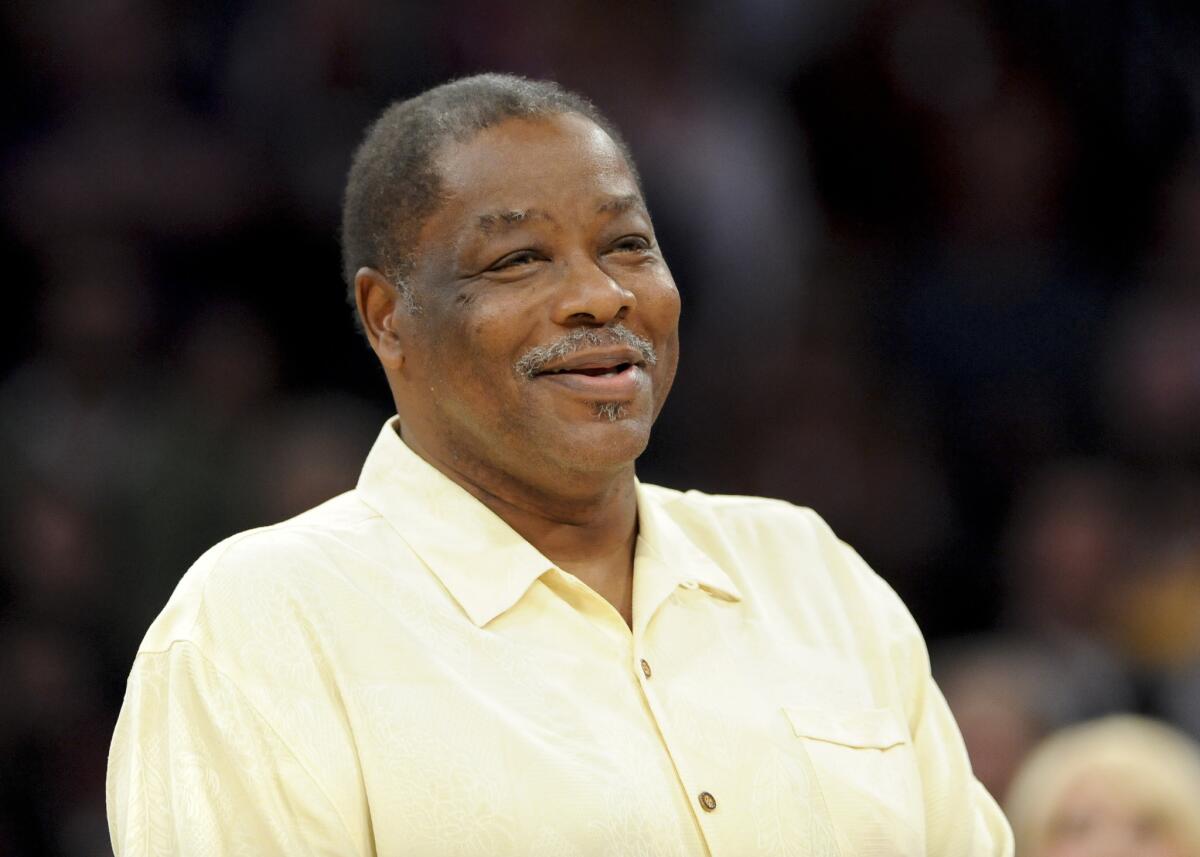 Former forward Jim McMillian is honored by the Lakers on Apr. 6, 2012. McMillian, who helped the Lakers to a 33-game winning streak and the 1972 NBA championship, died Monday, May 16.