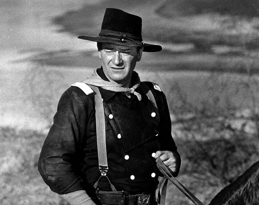 John Wayne appears during the filming of "The Horse Soldiers."