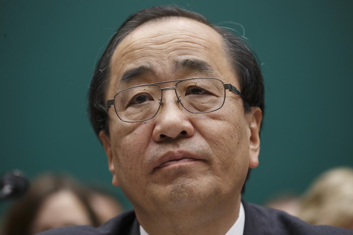 Hiroshi Shimizu, senior vice president of global quality assurance at Takata, testifies Dec. 3 before a House subcommittee examining ruptures and recalls of defective air bags made by his company.