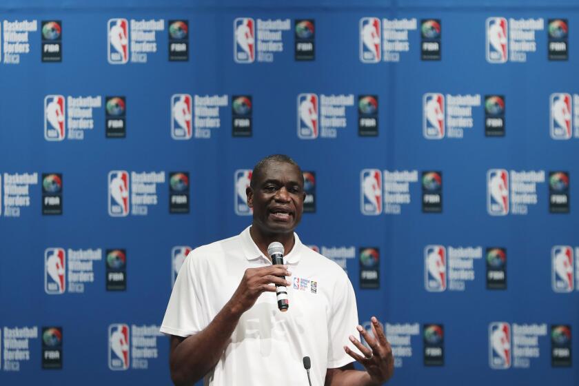 In this Aug. 1, 2018, file photo, Dikembe Mutombo speaks during the opening ceremony of Basketball without Borders Africa in Johannesburg, South Africa. U.S. health officials are turning to a basketball hall of famer for help in one of the deadliest Ebola outbreaks in history. Dikembe Mutombo is regarded as one of the greatest defensive players in NBA history and is a well-known philanthropist in his native Congo. He recorded radio and video spots designed to persuade people to take precautions and get care that might stop the disease's spread. (AP Photo/Themba Hadebe)