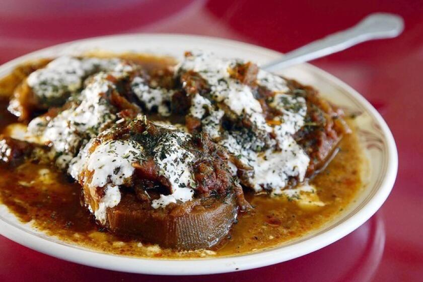 Toor banjan is eggplant cooked with garlic, onions and tomatoes.