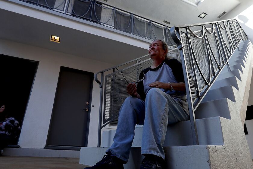 LONG BEACH, CALIF. - APRIL 26, 2018. Theresa Harvey is overcome with emotion as she talks about her impending eviction from an apartment in Long Beach. The property was recently purchased by a new owner and many longtime residents face the same fate as Harvey. (Luis Sinco/Los Angeles Times)