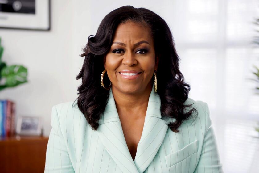 Michelle Obama presents the Social Justice Impact Award