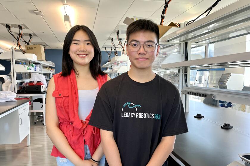 Erica Zhang and Anthony Hsieh at University Lab Partners in Irvine.