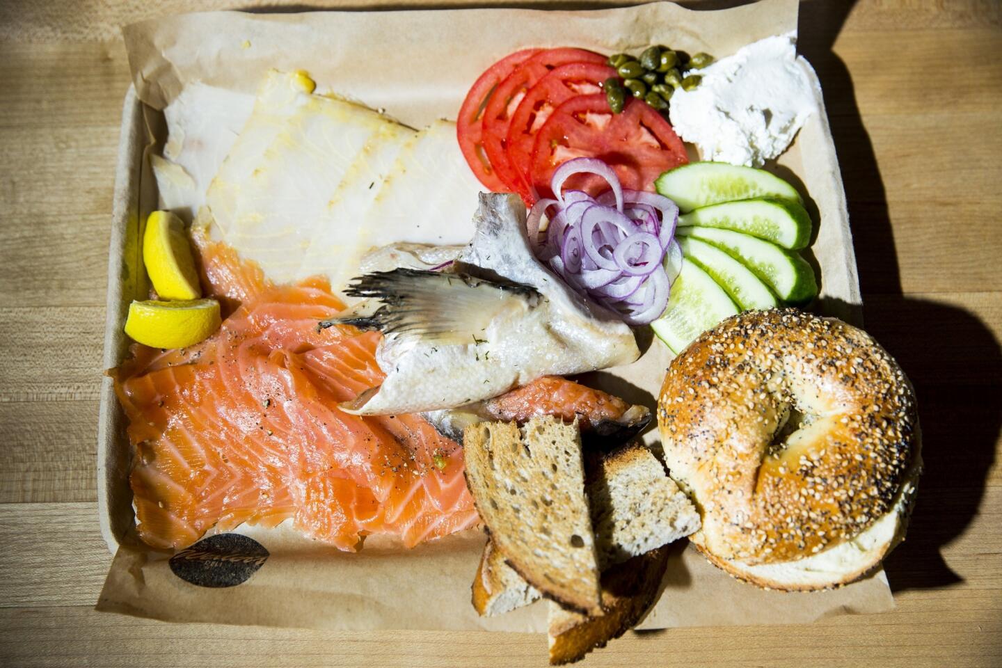 The smoked fish plate, with lox, sturgeon salmon collar, everything bagel and toasted rye bread, for $22.