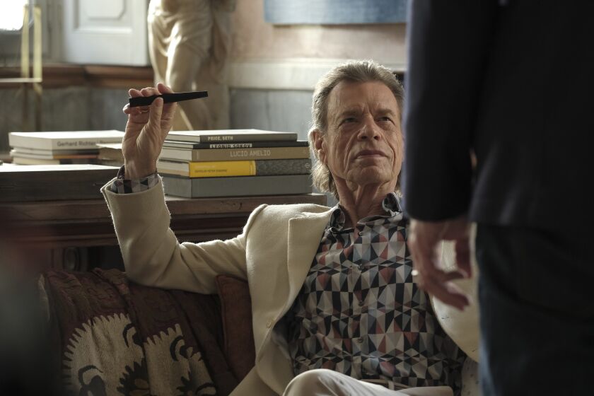 Mick Jagger as Joseph Cassidy in a scene from "The Burnt Orange Heresy." Credit: Jose Haro/Sony Pictures Classics