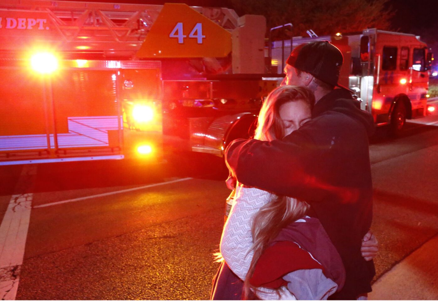 Molly Esterline and David Crawford comfort each other after the shooting.