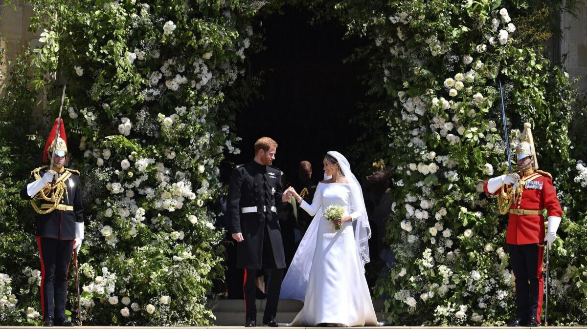 Prince Harry and Meghan Markle leave St. George's Chapel in Windsor Castle after their wedding.