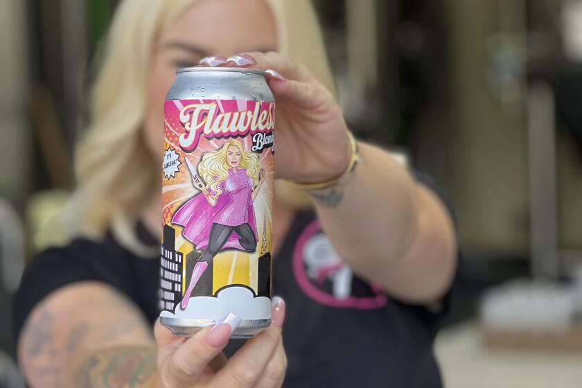 Lauren Lawless with her Flawless Blonde Ale.