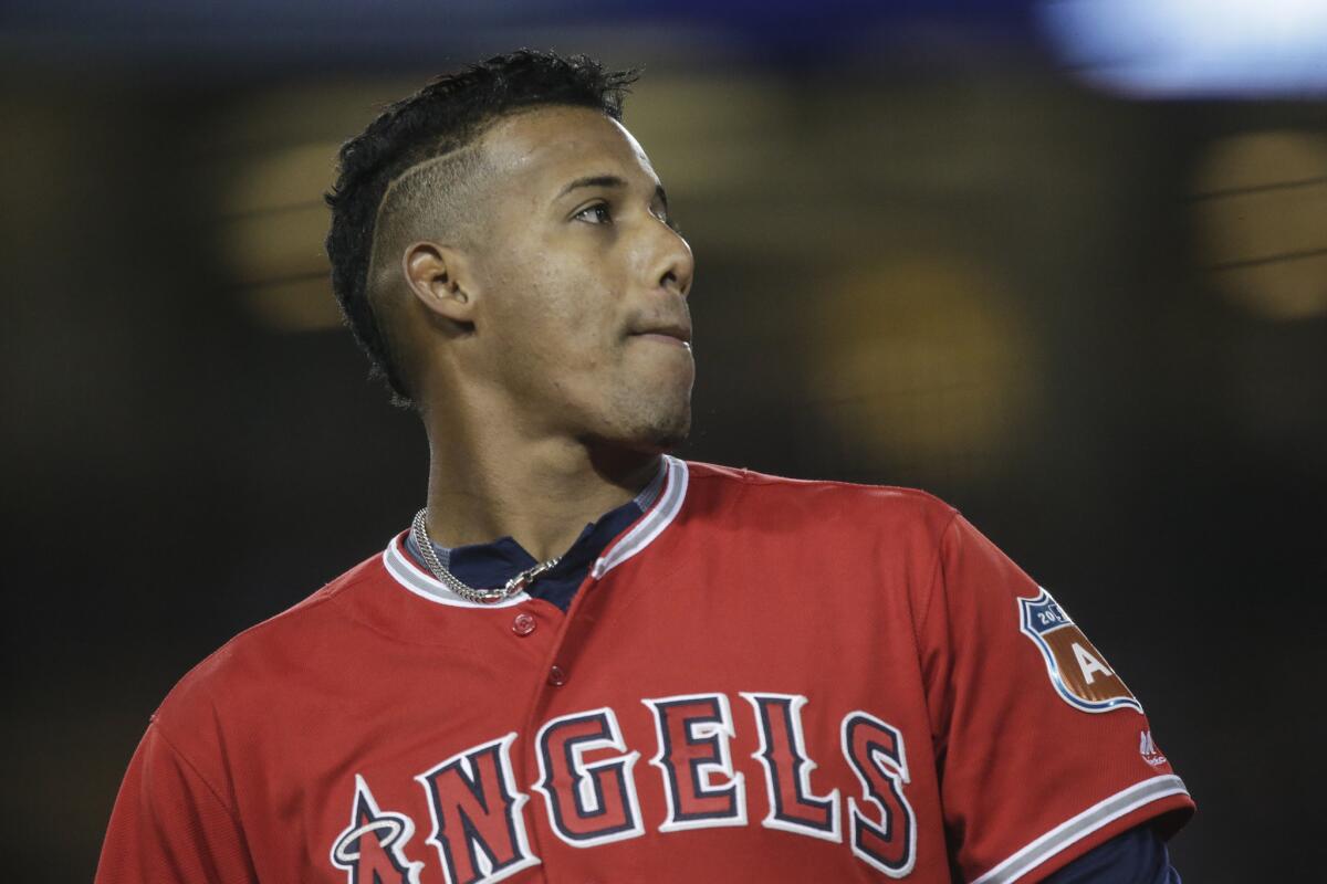 Angels infielder Yunel Escobar during warmups before an exhibition game against the Dodgers at Dodger Stadium.