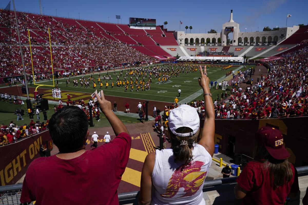 Southern California fans cheer as the band plays