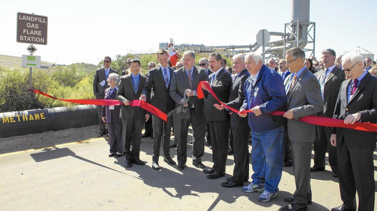 An opening ceremony for the Bowerman Landfill's power plant included a ribbon cutting Tuesday.