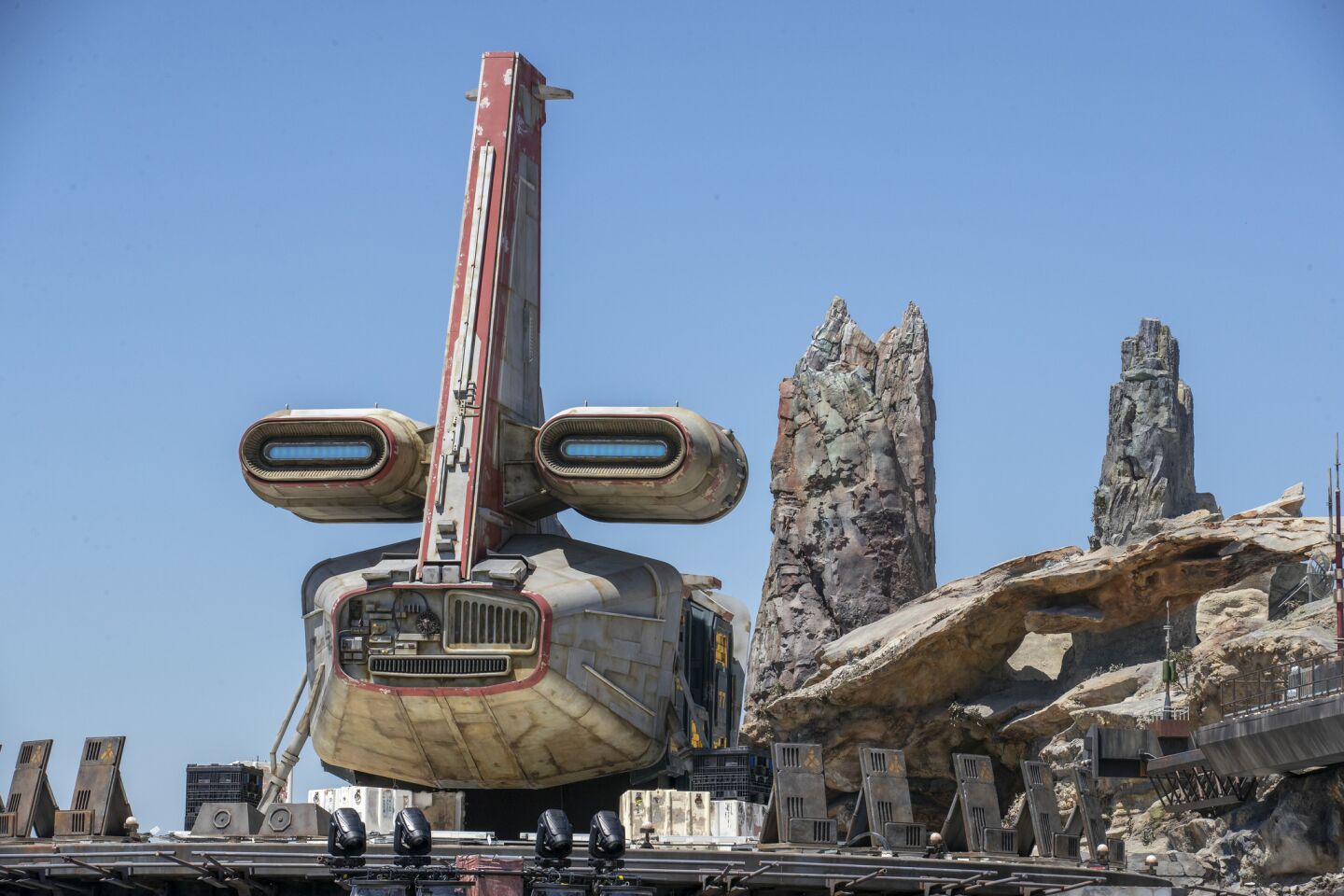 A view of a transport vehicle on top of Docking Bay 7 Food and Cargo inside Star Wars: Galaxy's Edge.